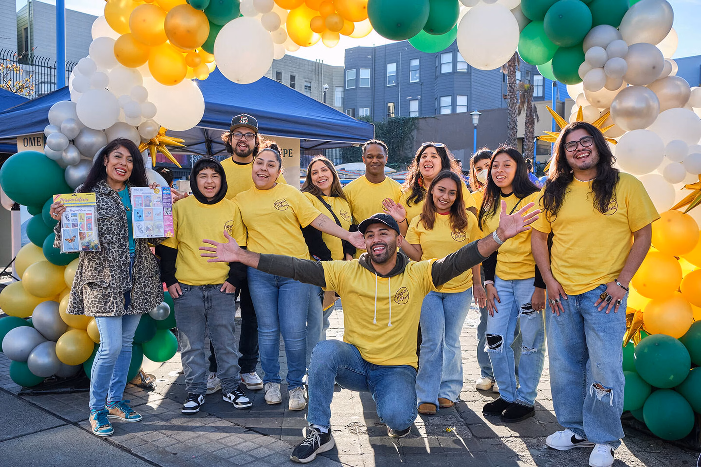 The Mission Lotería team and community at an event